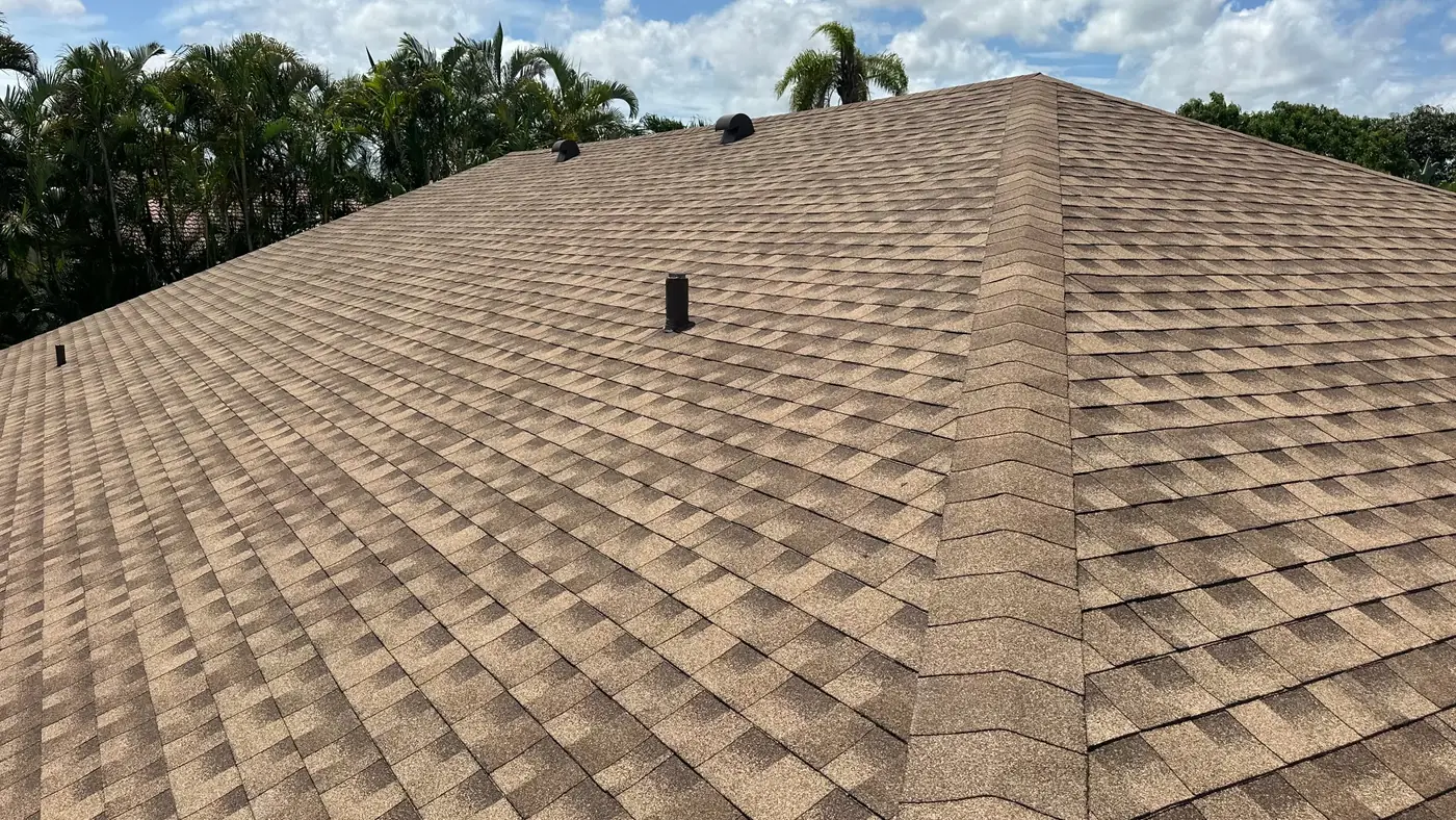 Completed GAF Timberline asphalt shingle roof in the Shakewood color in Deerfield Beach, Florida.