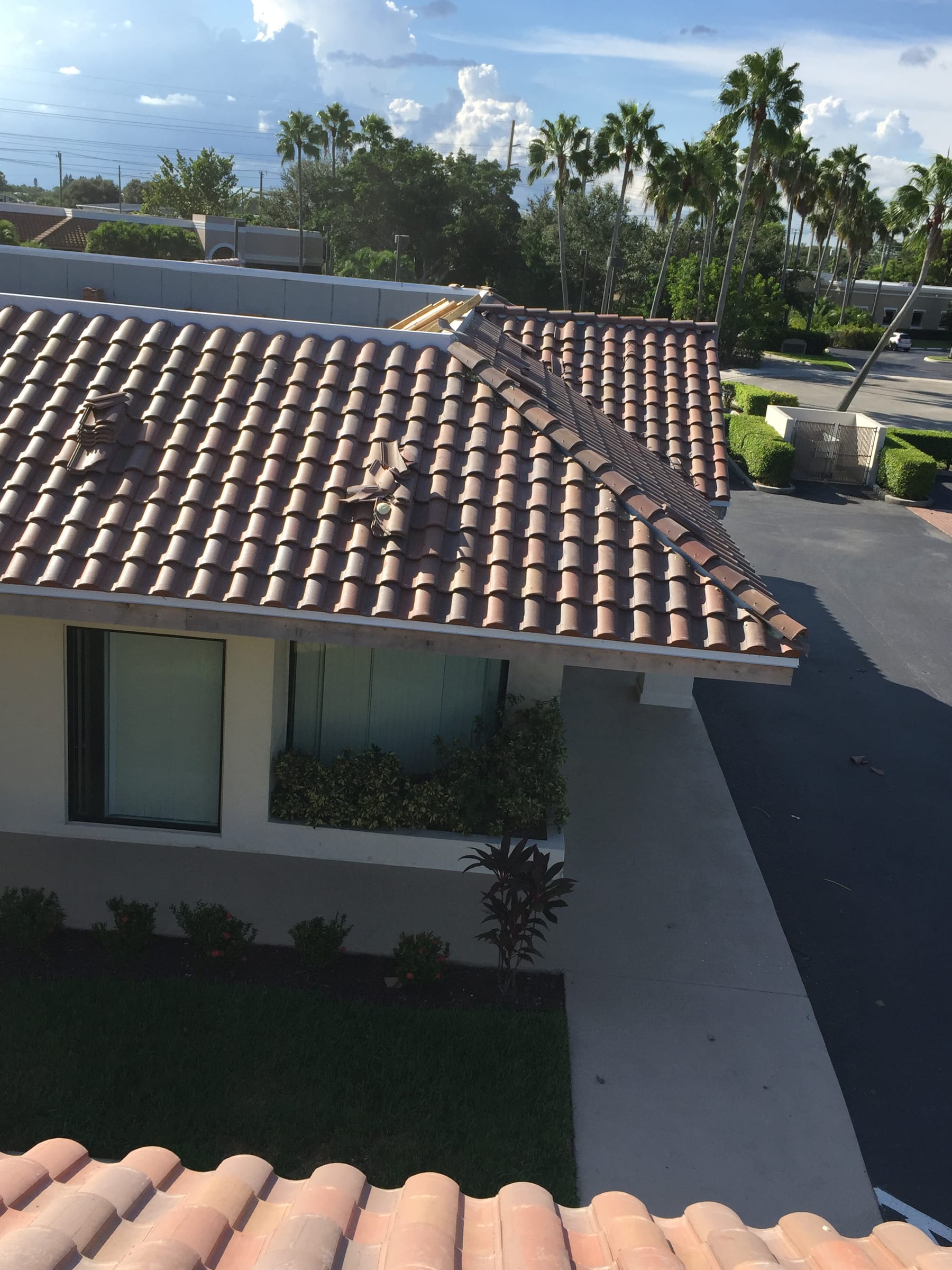 Barcelona 900 high-profile concrete roof tile installed on a South Florida home in an M&M Roofing jobsite photo.