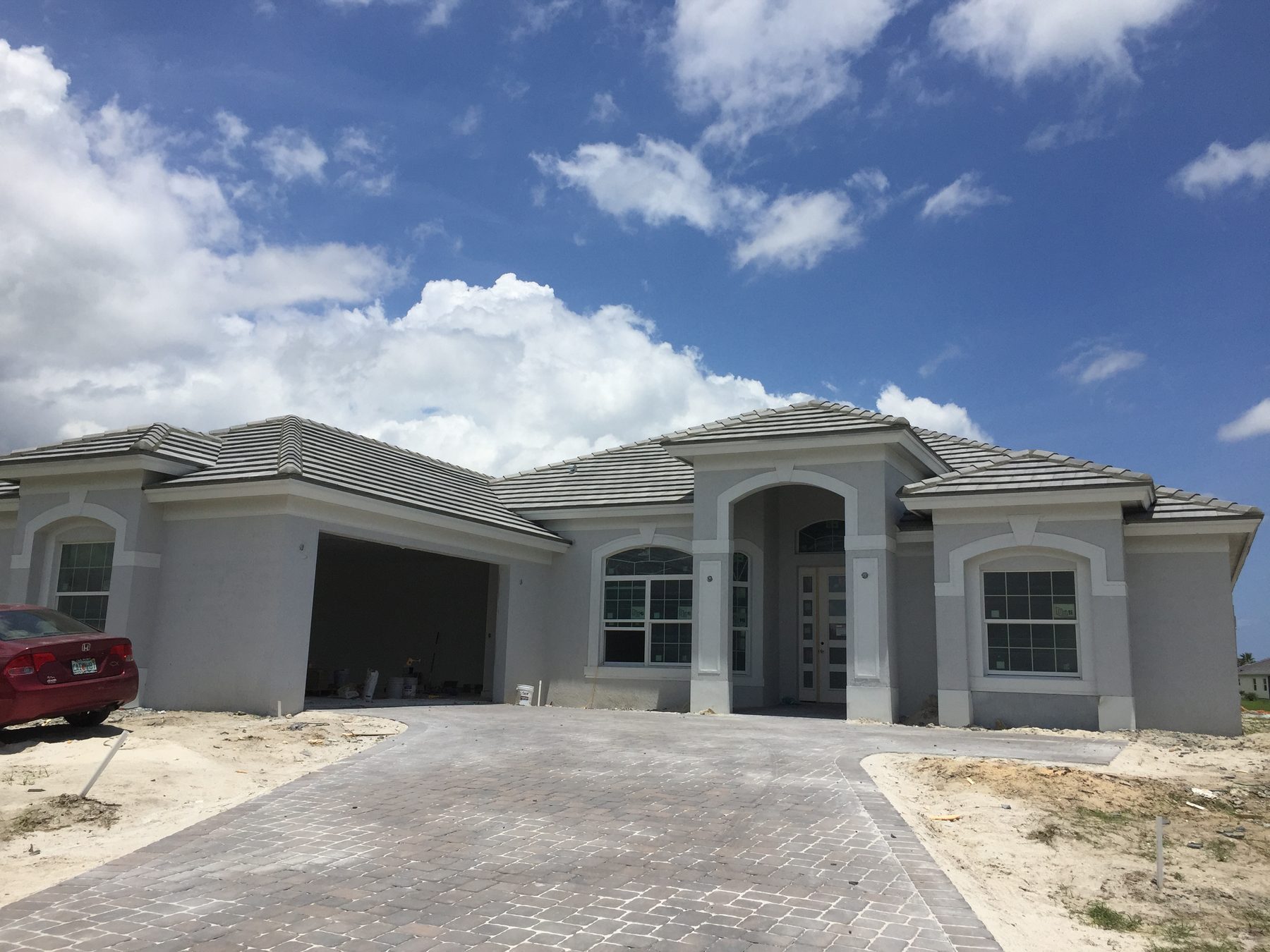 M&M Roofing completed flat concrete tile roof on a Florida home